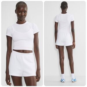 Aritzia TNA Cozy Sweatfleece Perfect Hi-Rise Mini Short in White | Size 2XS